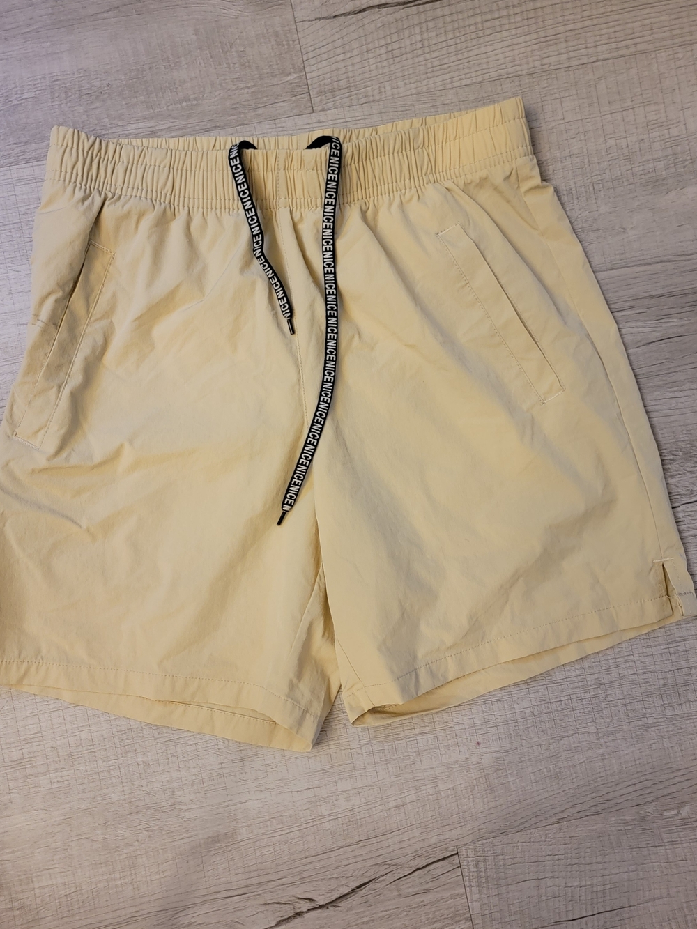 Men's Pale Yellow Swim Board Shorts with Black Logo Drawcord